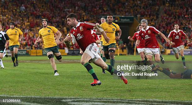 Alex Cuthbert of the Lions breaks clear to score the Lions second try during the First Test match between the Australian Wallabies and the British &...