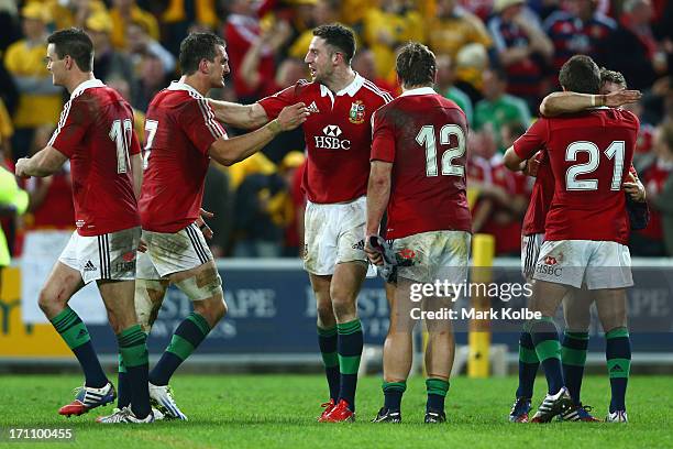 Sam Warburton and Alex Cuthbert of the Lions celebrate victory during the First Test match between the Australian Wallabies and the British & Irish...