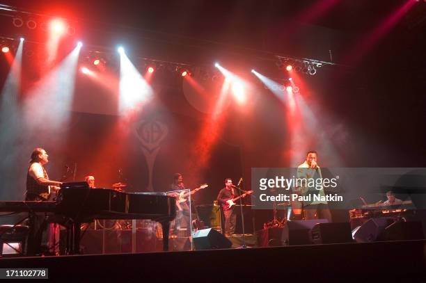 American jazz and R&B musician George Benson performs with his band on stage at the Oriental Theater, Chicago, Illinois, May 1, 2004.