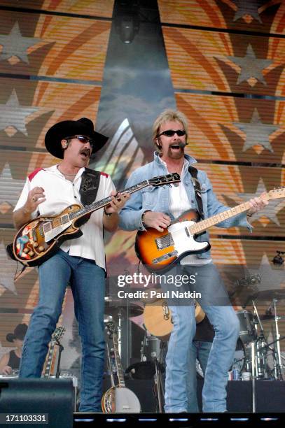 American country musicians Kix Brooks and Ronnie Dunn, who perform as Brooks and Dunn, onstage at Farm Aid in the Germain Amphitheater, Columbus,...