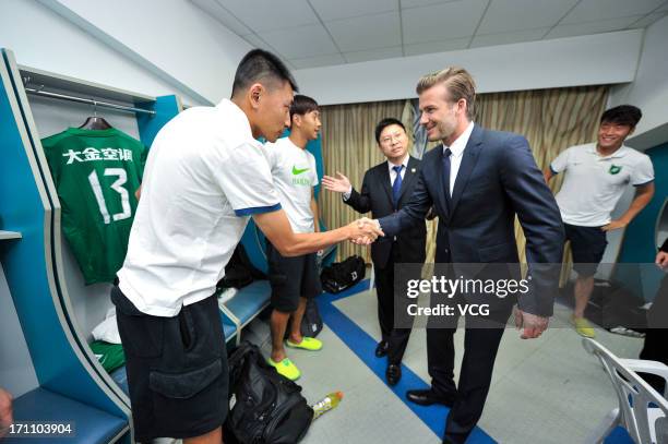 David Beckham visits the changing room of Hangzhou Greentown prior to the Chinese Super League between Hangzhou Greentown and Beijing Guoan at Yellow...