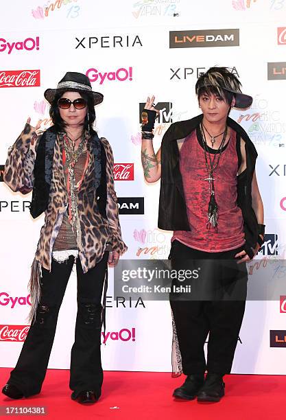 And K.A.Z of VAMPS poses for photos during MTV VMAJ 2013 at Makuhari Messe on June 22, 2013 in Chiba, Japan.