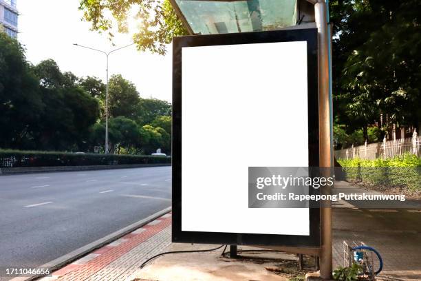 blank street billboard poster stand in urban park - billboard posting stock pictures, royalty-free photos & images
