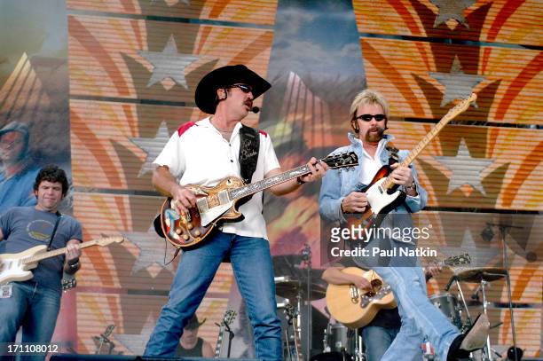 American country musicians Kix Brooks and Ronnie Dunn, who perform as Brooks and Dunn, onstage at Farm Aid in the Germain Amphitheater, Columbus,...