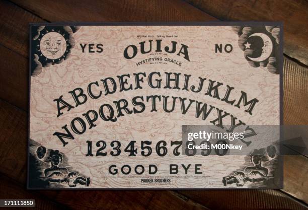 oujia board on wooden table - ouija board stock pictures, royalty-free photos & images