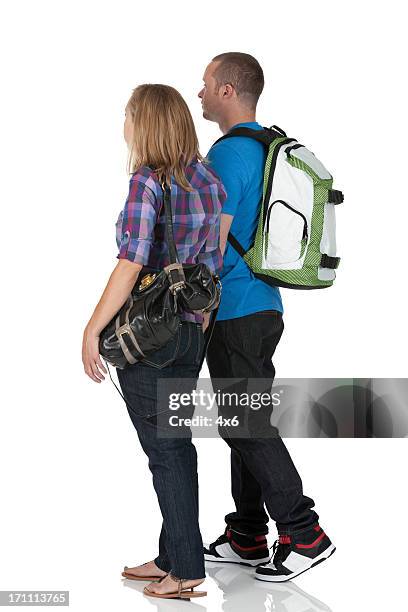 profile of a couple walking - couple walk white background stock pictures, royalty-free photos & images