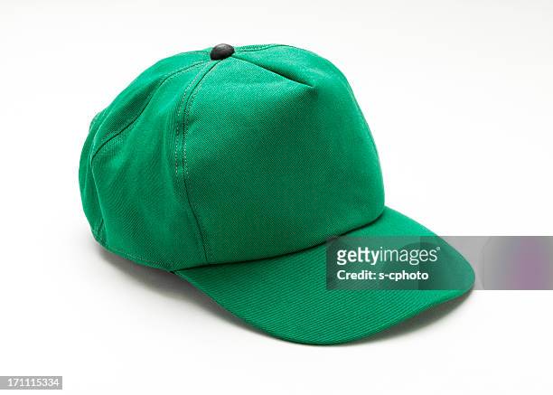 green cap - white hat fashion item stockfoto's en -beelden
