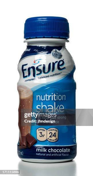 ensure milk chocolate nutrition shake - chocolate milk bottle stock pictures, royalty-free photos & images