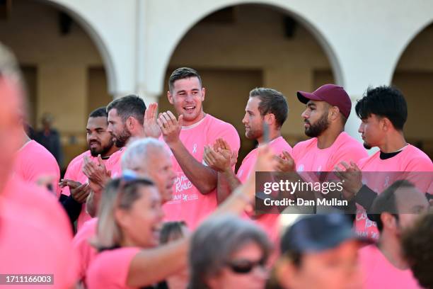 Freddie Steward of England as his team mates applaud the competitors during the Corrida Rose, a 10km charity race on October 01, 2023 in Le...