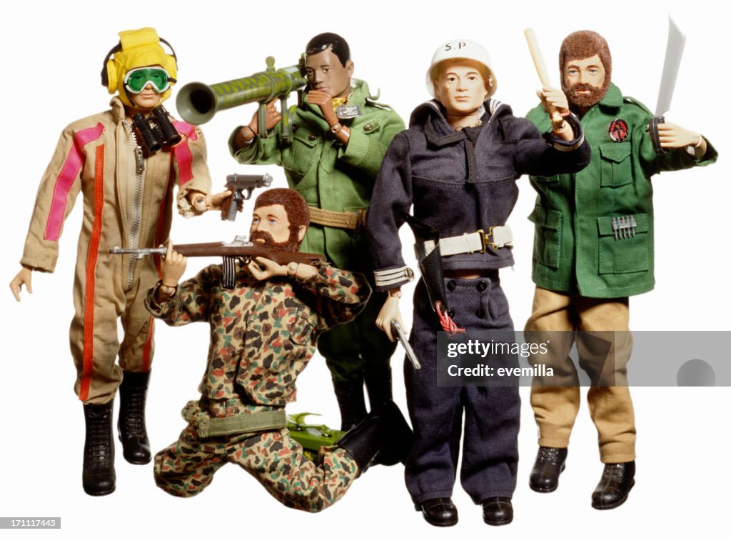 Soldati giocattolo su bianco.