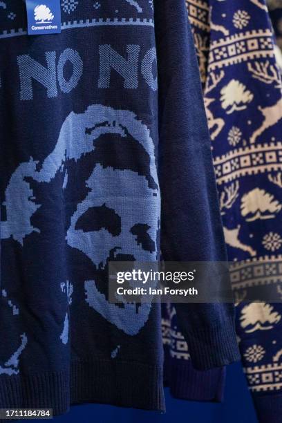 Christmas jumpers are sold in the Conservative Party shop on the first day of the Conservative Party Conference on October 01, 2023 in Manchester,...