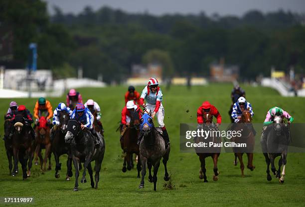 Jamie Spencer riding on York Glory celebrates as he crosses the finish line to win The Wokingham Stakes during day five of Royal Ascot at Ascot...
