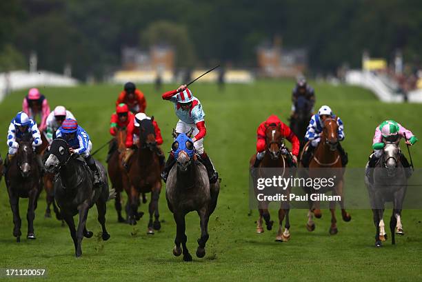 Jamie Spencer riding on York Glory celebrates as he crosses the finish line to win The Wokingham Stakes during day five of Royal Ascot at Ascot...