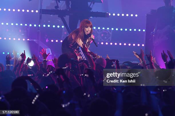 Carly Rae Jepsen perfoms onstage during the MTV VMAJ 2013 at Makuhari Messe on June 22, 2013 in Chiba, Japan.