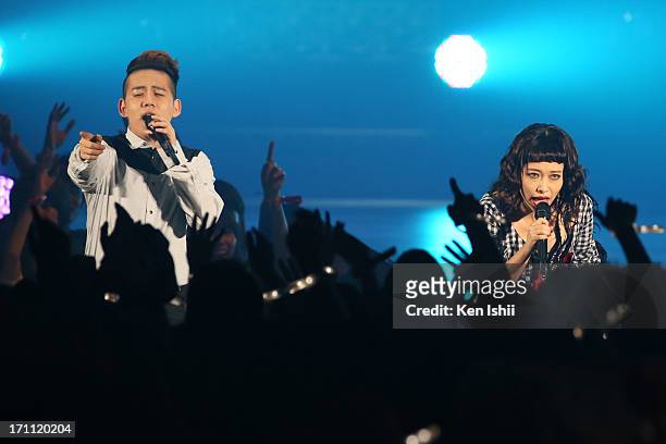 Syota Shimizu and Miliyah Kato perfom onstage during the MTV VMAJ 2013 at Makuhari Messe on June 22, 2013 in Chiba, Japan.