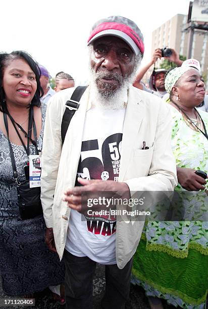 Comedian and social activist Dick Gregory marches in the 50th Anniversary Commemorative Freedom Walk June 22, 2013 in Detroit, Michigan. The march...