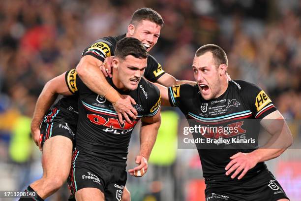 Nathan Cleary of the Panthers celebrates with team mates during the 2023 NRL Grand Final match between Penrith Panthers and Brisbane Broncos at Accor...