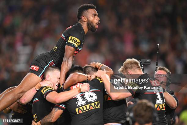 Panthers celebrate during the 2023 NRL Grand Final match between Penrith Panthers and Brisbane Broncos at Accor Stadium on October 01, 2023 in...
