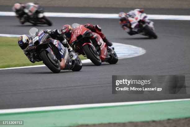 Raul Fernandez of Spain and Cryptodata RNF MotoGP Team leads the field during the MotoGP race during the MotoGP of Japan - Race at Twin Ring Motegi...