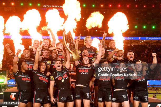 Panthers celebrate with the trophy during the 2023 NRL Grand Final match between Penrith Panthers and Brisbane Broncos at Accor Stadium on October...