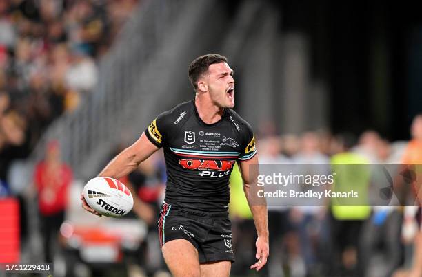 Nathan Cleary of the Panthers celebrates after scoring the match winning try during the 2023 NRL Grand Final match between Penrith Panthers and...