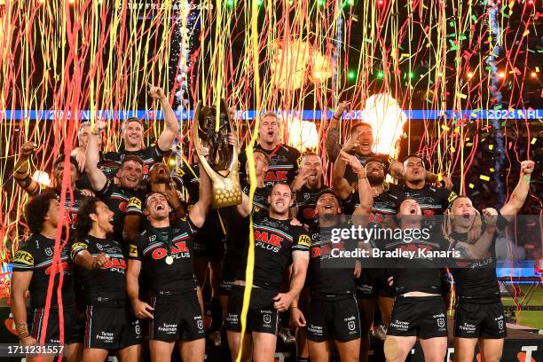 Panthers celebrate with the trophy during the 2023 NRL Grand Final match between Penrith Panthers and Brisbane Broncos at Accor Stadium on October...