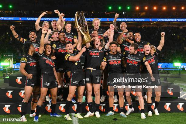 Panthers celebrate with the trophy during the 2023 NRL Grand Final match between Penrith Panthers and Brisbane Broncos at Accor Stadium on October...