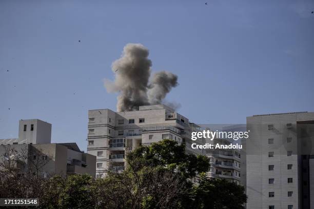 Smoke rises from an apartment fired with rockets by Palestinians in response to Israeli airstrikes during an operation in Ashkelon, Israel on October...