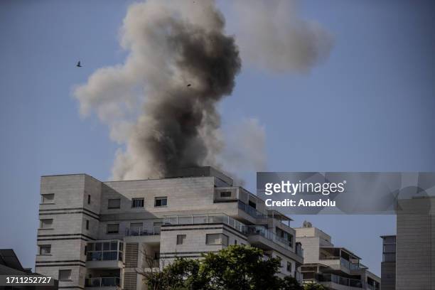 Smoke rises from an apartment fired with rockets by Palestinians in response to Israeli airstrikes during an operation in Ashkelon, Israel on October...