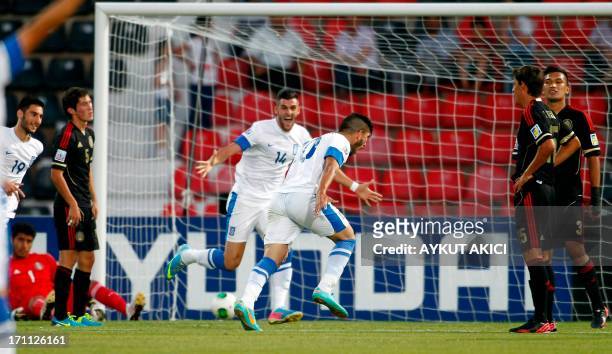 Greece's Dimitrios Kovolos celebrates after scoring a goal during the group stage football match between Mexico and Greece at the FIFA Under 20 World...