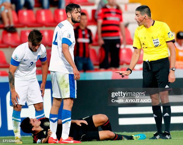 Mexico's Carlos Alberto Trevino lays on the during during the group stage football match between Mexico and Greece at the FIFA Under 20 World Cup at...