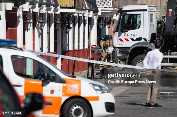 Firefighters work at the Teatre nightclub where there has been a fire, in the leisure area of Las Atalayas, on October 1 in Murcia, Region of Murcia,...