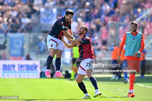Riccardo Orsolini of Bologna FC celebrates after scoring his team's second goal with Lorenzo De Silvestri of Bologna FC during the Serie A TIM match...