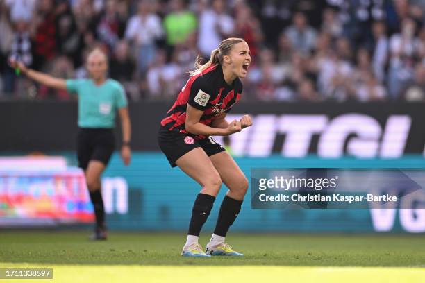Laura Freigang of Eintracht Frankfurt celebrates after scoring her team`s first goal during the Google Pixel Women's Bundesliga match between...