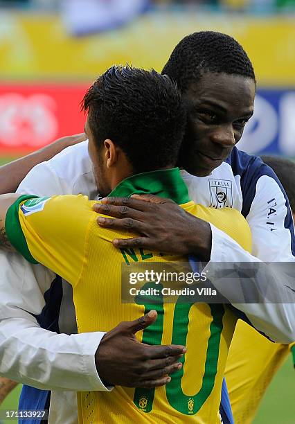 Neymar of Brazil and Mario Balotelli of Italy embrace prior to the FIFA Confederations Cup Brazil 2013 Group A match between Italy and Brazil at...