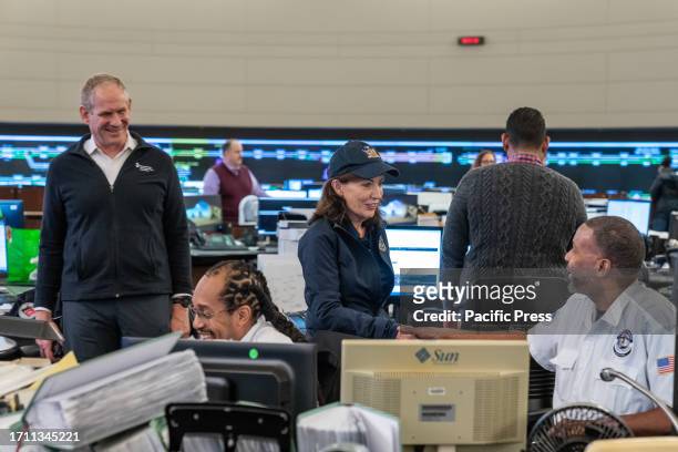 Governor Kathy Hochul and MTA CEO Janno Lieber visit Rail Control Center to thank transit workers for their work during a historic storm as rain...
