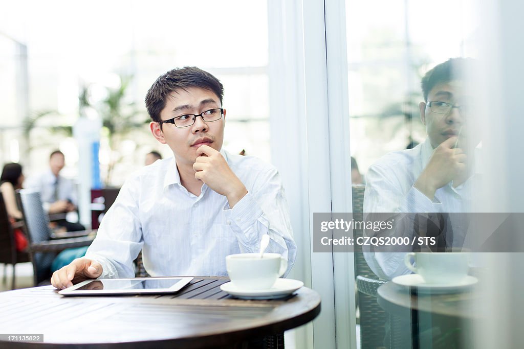 Businessman in cafe