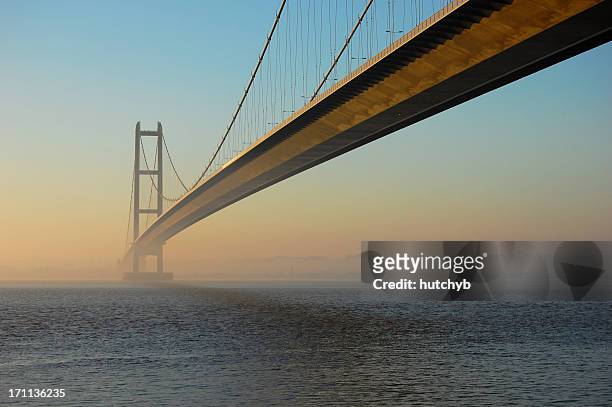 humber bridge at twilight - hull uk stock pictures, royalty-free photos & images