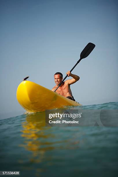 mature man on kayak - 40 49 years stock pictures, royalty-free photos & images