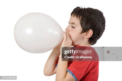 Junge Blasen eine balloon Junge Blasen eine balloon