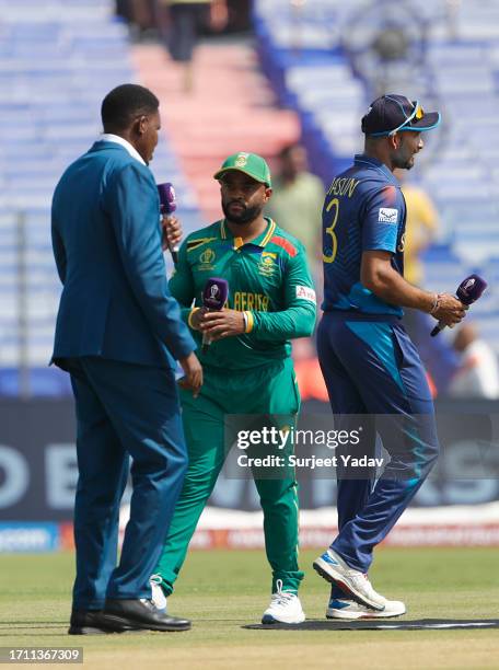 Dasun Shanaka of the Sri Lanka and Temba Bavuma of the South Africa after toss during the ICC Men's Cricket World Cup India 2023 between South Africa...