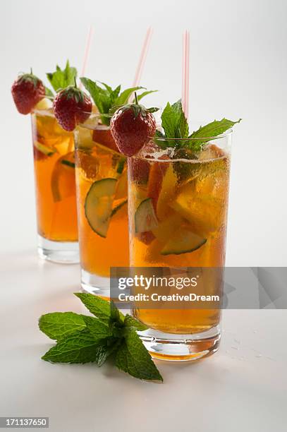 three glasses of refreshing fruit punch drink - cucumber cocktail stock pictures, royalty-free photos & images