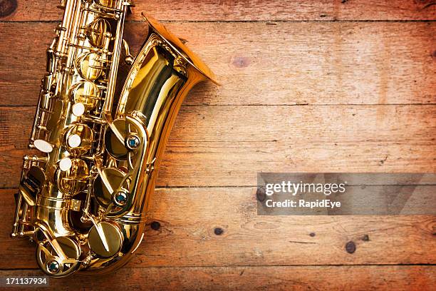 saxophone on wood - big band stock pictures, royalty-free photos & images
