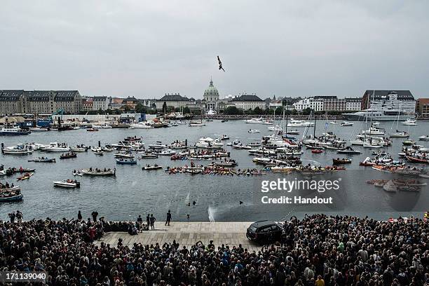 In this handout image provided by Red Bull, David Colturi of the USA dives from the 28 metre platform at the Copenhagen Opera House during the second...