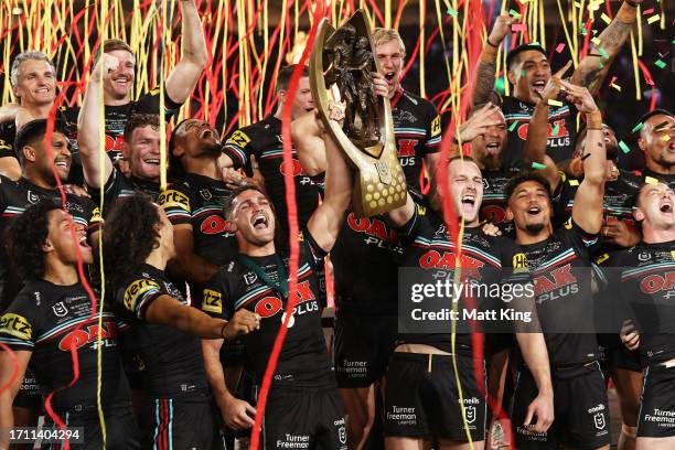 Nathan Cleary and Isaah Yeo of the Panthers hold aloft the Provan-Summons Trophy after winning the 2023 NRL Grand Final match between Penrith...