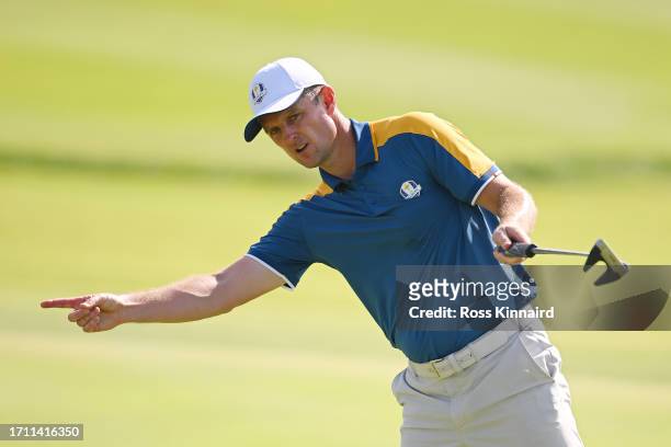 Justin Rose of Team Europe reacts to a putt on the 12th green during the Sunday singles matches of the 2023 Ryder Cup at Marco Simone Golf Club on...