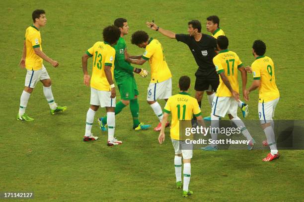 Brazil players protest to referee Ravshan Irmatov as Giorgio Chiellini of Italy scores their second goal during the FIFA Confederations Cup Brazil...