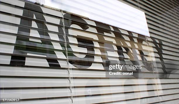 agency text on the glass window - estate agency stock pictures, royalty-free photos & images