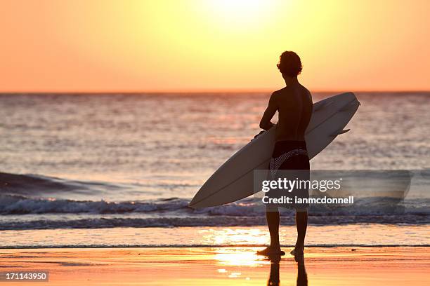 sunset surfer - playa grande dominican republic bildbanksfoton och bilder