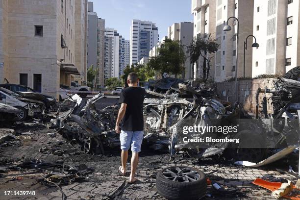 Cars damaged during a rocket attack in Ashkelon, Israel, on Saturday, Oct. 7. 2023. Israel declared a rare state of alert for war on Saturday after...